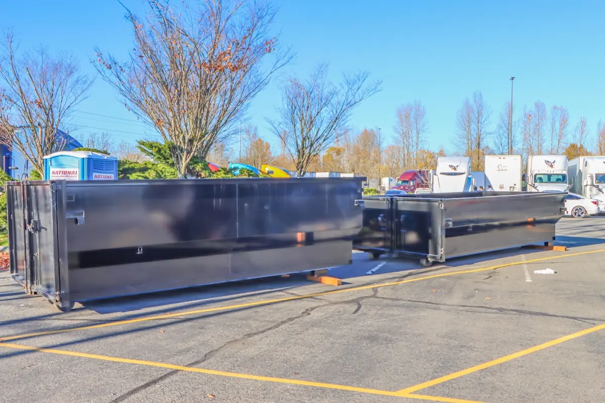 Professional dumpster rental service with roll-off container on residential driveway in Los Altos Hills